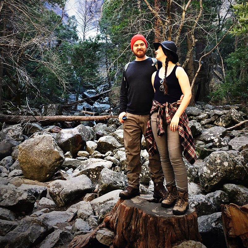 cap and Lelo infront of a waterfall